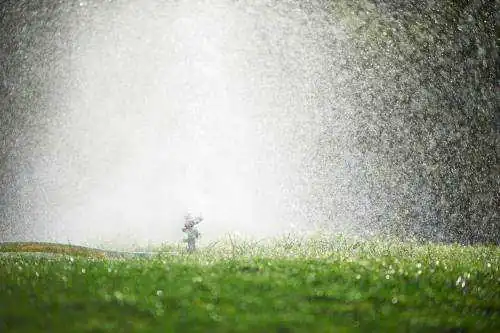 Lawn Sprinkler Spaying Water 2022 12 16 14 54 58 Utc.jpg