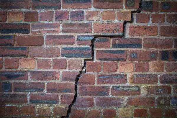 Stair Crack in brick wall caused by foundation issues